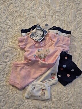 Gerber girls NB 3 pack of bodysuits 3 designs NWT